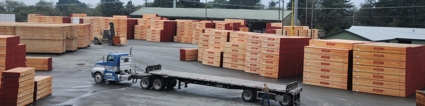 an aerial view of stacks of Douglas Fir lumber in the South Coast Lumber yard