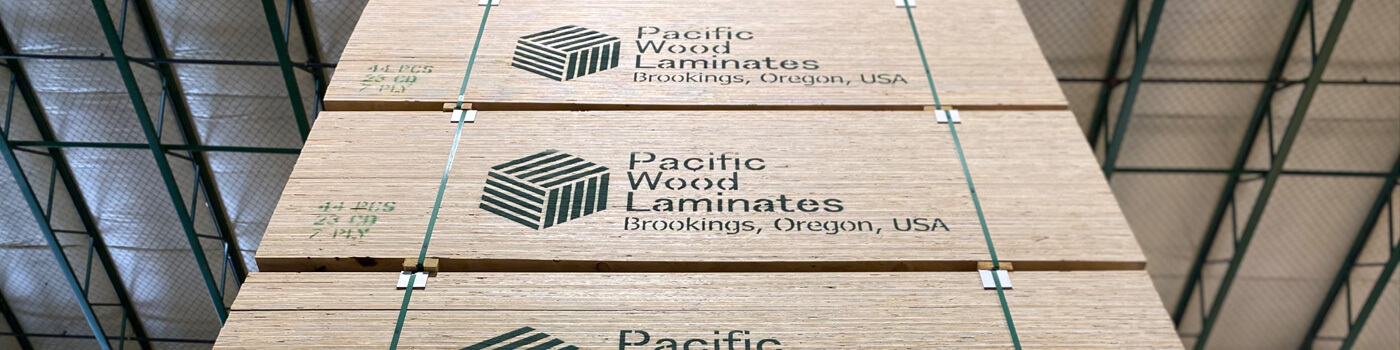 Stacks of Pacific Wood Laminate product in the warehouse